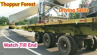 Thoppur Forest - Long Heavy Vechicles Slowly Crossing Big Curve Down Road At NH44 Thoppur Kanavai