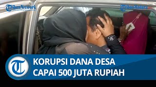 Wanita Berhijab Ini Cium Pipi Terduga Pelaku Korupsi Dana Desa yang Diciduk Polres Bangkalan