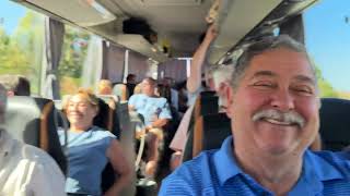 Fredrico Singing Amare on bus with Travel Group