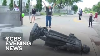 Protesters topple statues seen as symbols of oppression