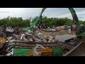 shredding scrap metal on a rainy day in miami