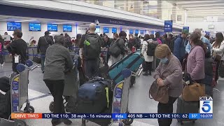 Millions swarm LAX and as the holiday travel rush begins