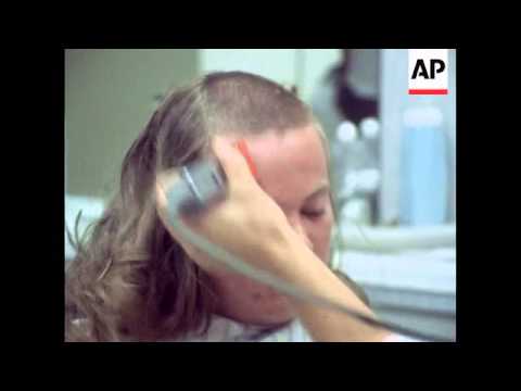 Army recruits with long hair get regulation army haircuts - 1973 Army recruits with long hair get regulation army haircuts - 1973