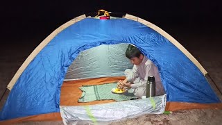 solo camping in the forest alone enjoying nature and cooking