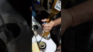 HOW TO OPEN A BEER BOTTLE WITH ANOTHER BEER BOTTLE