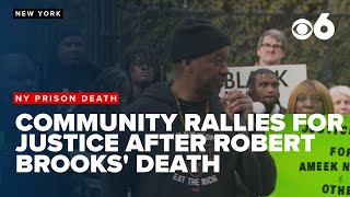 Community members rally for justice following the fatal prison beating of Robert Brooks