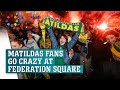 Matildas fans light flares at Federation Square after win