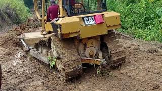 Excellent Work Caterpillar D6R XL Bulldozer Operator Works to Smooth Plantation Roads