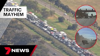 Highway hell after a truck crashes into a Werribee overpass | 7NEWS