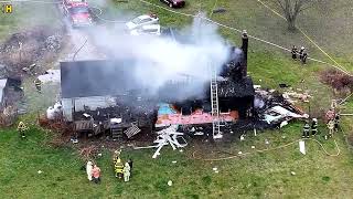 DRONE VIDEO: Crews battle house explosion in Geauga County that left father, daughter injured