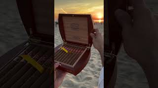 Looking at beautiful Partagas Aliados at the beach #habanos #cigarstyle #estetica