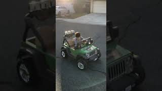 Green Jeep Wrangler power wheels