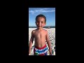 conversation with my grandson on the beach