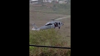 HSC-25 Water Drop During Wild Land Fire on Guam