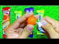 asmr most popular candys some lots of colorful rainbow lollipop candy unpacking chocolate eat