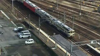 東横イン弘前駅前からのトレインビュー4・キハ40五能色＋タラコの4両編成が弘前駅に入線