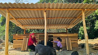 The single mother and her daughter completed the new roof and pigsty after many days of hard work