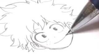 Mangaka Kōhei Horikosh drawing Deku from  My Hero Academy