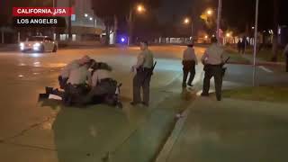 Video shows police pinning journalist covering LA protest to ground during arrest