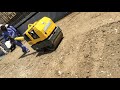 Compaction of backfilling soil with hand roller compactor