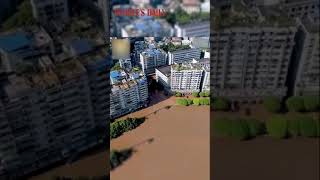 Aerial video shows #flood is overflowing the center of  SW China's Chongqing.