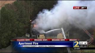 Crews battle large apartment fire in DeKalb Couny