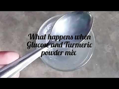 What happens when turmeric is added to sugar solution?