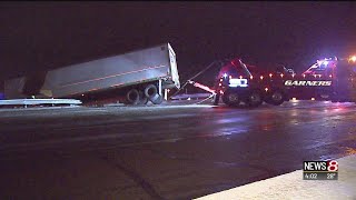 Semi slides off interstate