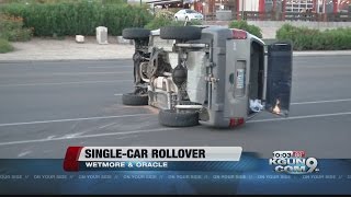 Overturned car in midtown