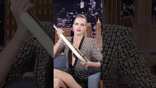 Cara Delevingne plays on guitar behind her head! #star #interview #CaraDelevingne #celebrities