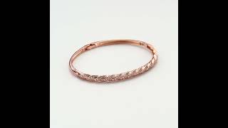 Rose Gold Plated Twist Bangle Created with Zircondia® Crystals by Philip Jones Jewellery