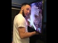 Drake Stan holds TV to his face as Drake performs Gyalchester
