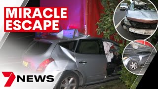 Man survives after his Nissan SUV crashed under a truck in Wetherill Park | 7NEWS