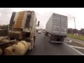 Crazy driving a motorcycle in São Paulo - Brazil. between the trucks!!!