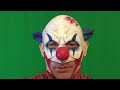 crazy clown slowly rises