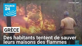 Grèce : des habitants tentent de sauver leurs maisons des flammes • FRANCE 24