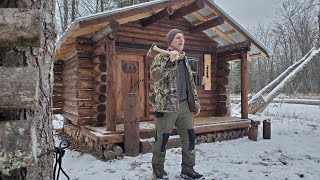 Cold and snowy log cabin in the woods overnight stay no electricity