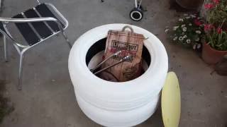 Repurpose old tyres to make a storage bin for braai accessories