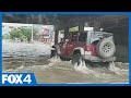 Flooding prompts water rescues in northwest Dallas