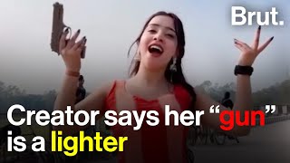 Girl flaunts “gun”… but she says it’s a lighter