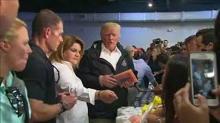 Trump throws paper towel rolls into crowd while delivering aid supplies in Puerto Rico