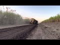 Dezzi H180T 4x4 Haulage Tractors hauling land trains to a Sugar Mill