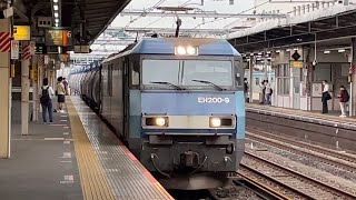 JR貨物EH200形9号機＋タキ12B（両）＋コキ1B（両）が大宮駅をブロワー起動しながら通過するシーン（臨8764レ・高A212・石油返空とコキ返却）