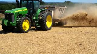 Spreading Straw. Seeding the lawn.