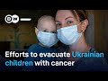 Ukrainian children living with cancer transferred abroad | DW News