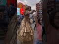 Golden statue lady in London #piccadillycircus #lady #gold #shorts #like #uk #entertainment #evening