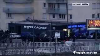 Hostages flee Paris supermarket