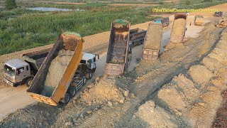 ឡានចាក់ដីធ្វើផ្លូវ Road construction - Awesome dump trucks loading dirt \u0026 Komatsu bulldozer pushing