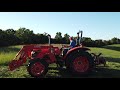 mowing third cut hay with superlime plus and fertilizer 160