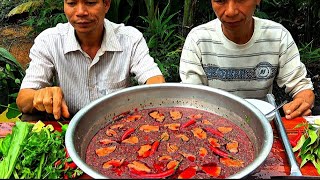 giant pot of cow's blood